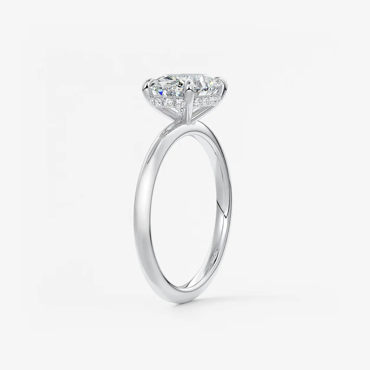 East-West Oval Moissanite Solitaire with Hidden Halo