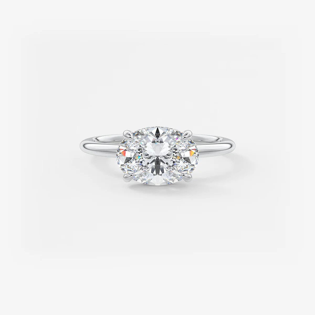East-West Oval Moissanite Solitaire with Hidden Halo